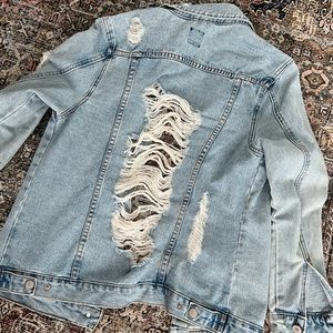 Distressed denim jacket